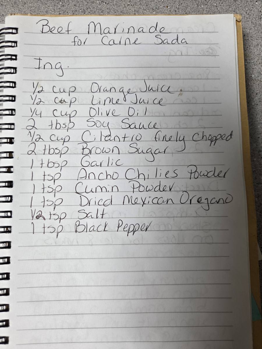 Becky's handwritten Beef Marinade for Carne Asada recipe — notebook page 1