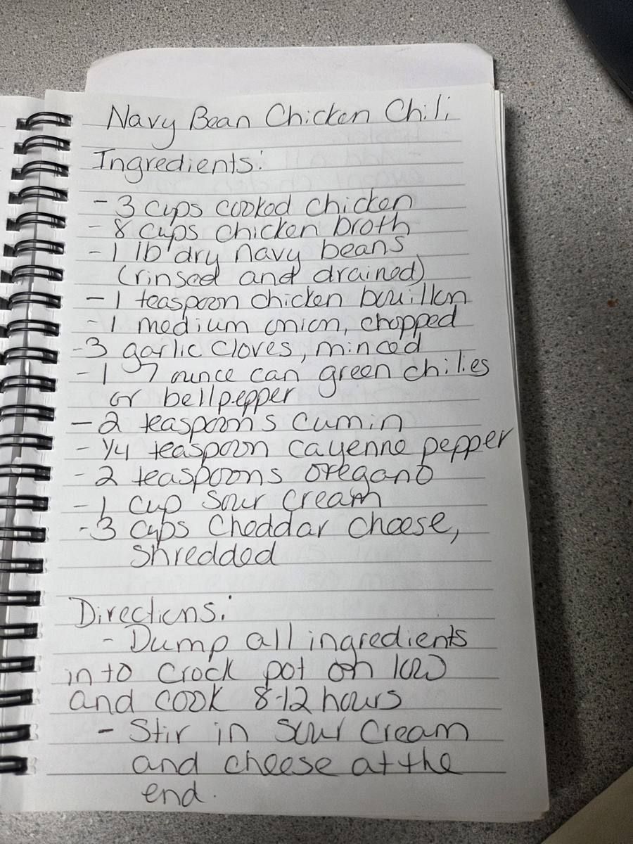 Becky's handwritten Fissler Navy Bean Chicken Chili recipe — notebook page 1