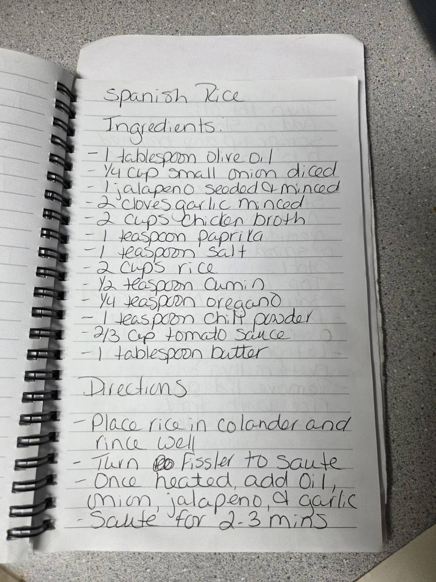 Becky's handwritten Fissler Spanish Rice recipe — notebook page 1