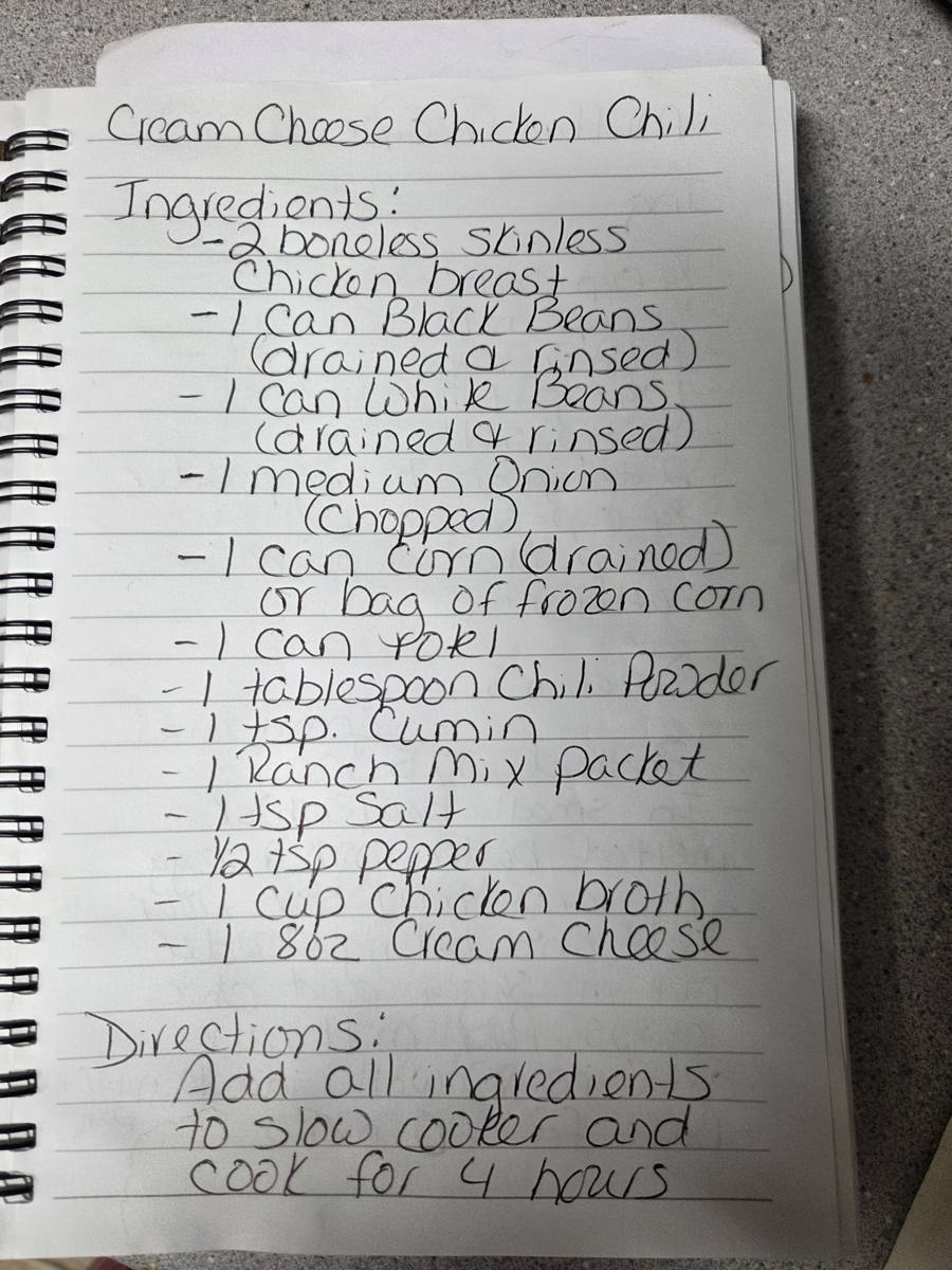 Becky's handwritten Slow Cooker Cream Cheese Chicken Chili recipe — notebook page 1