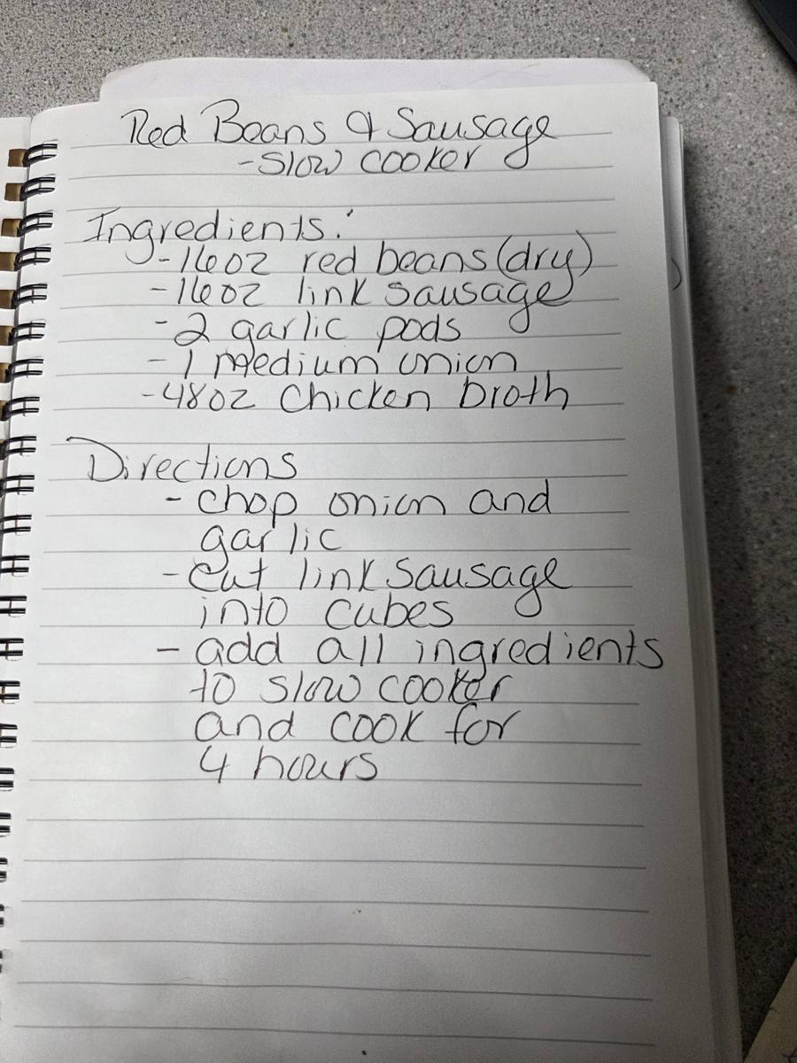 Becky's handwritten Slow Cooker Red Beans and Sausage recipe — notebook page 1